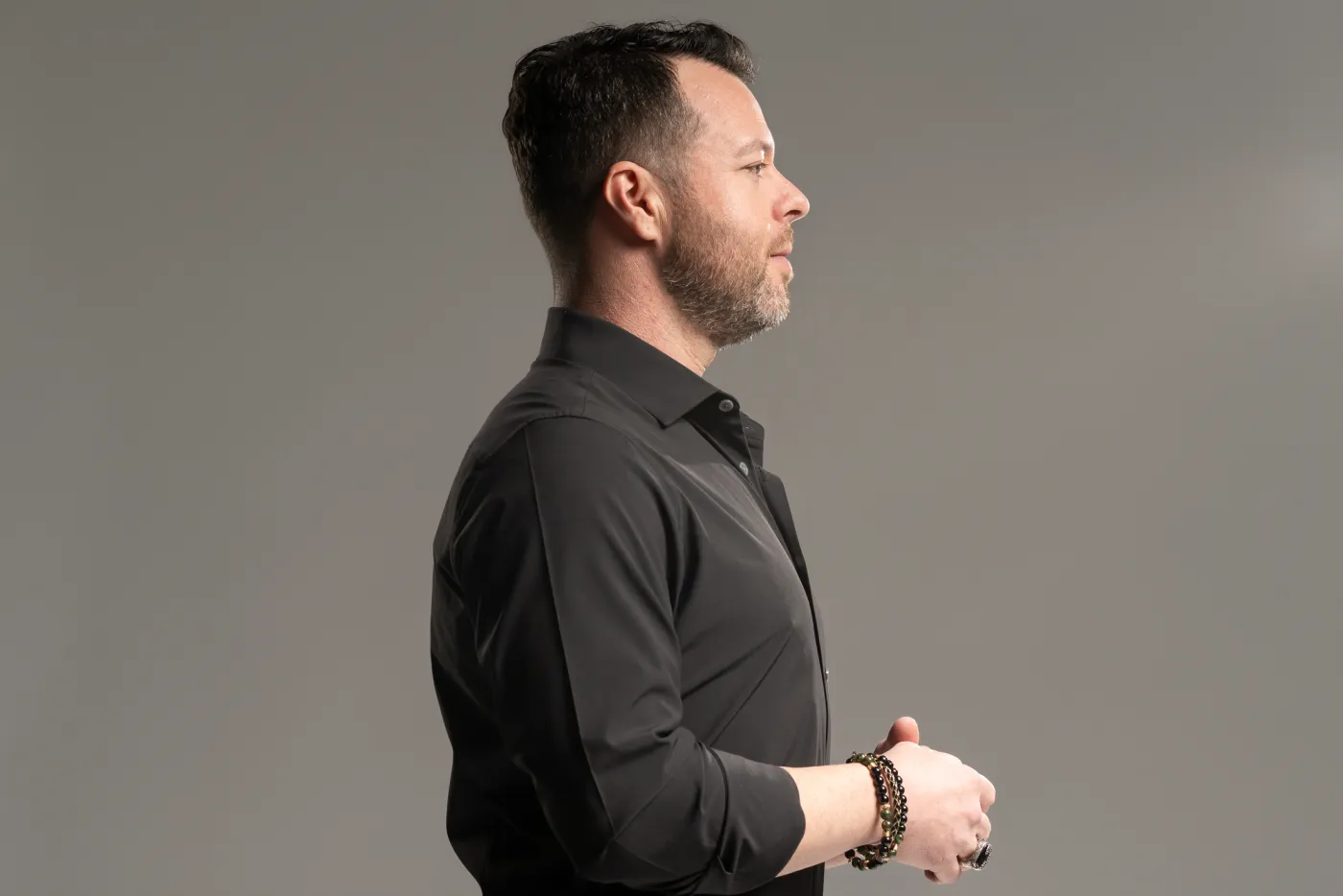 Sam Wakefield delivering a keynote on stage